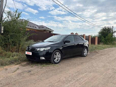 2012 Kia Cerato 6-speed II, чёрный, 950000 рублей, вид 2