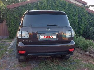 2011 Nissan Patrol VI (Y62), пурпурный, 1750000 рублей, вид 4