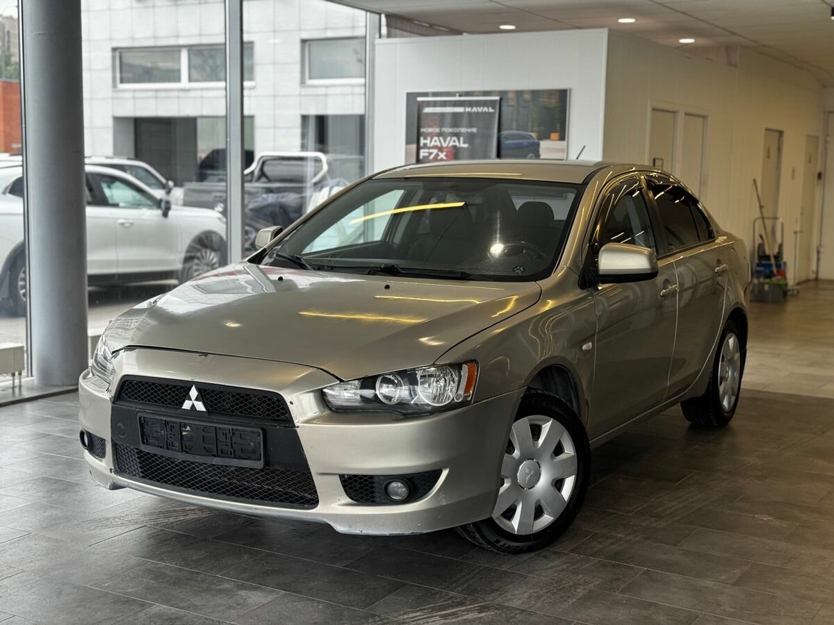 Открыть фотографии: Mitsubishi Lancer X