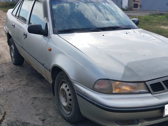 2008 Daewoo Nexia I, серебристый - вид 2