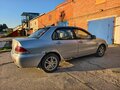 2006 Mitsubishi Lancer IX Рестайлинг, серебристый, 200000 рублей - вид 3