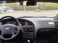 2010 Hyundai Elantra ТагАЗ III (XD2) Рестайлинг, красный - вид 10