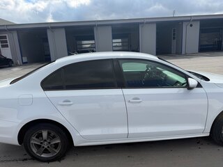 2016 Volkswagen Jetta VI Рестайлинг, белый, 1250000 рублей, вид 4