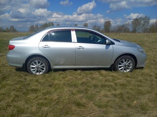 2011 Toyota Corolla X (E140, E150) Рестайлинг, серебристый, 800000 рублей, вид 4
