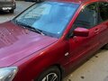 2004 Mitsubishi Lancer IX, красный, 309000 рублей - вид 2
