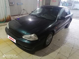 2001 Kia Clarus II, зелёный, 250000 рублей, вид 4