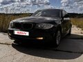 2011 BMW 1 серии 116i I (E81/E82/E87/E88) Рестайлинг, чёрный, 990000 рублей - вид 1