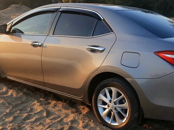 2014 Toyota Corolla XI (E160, E170, E180), золотистый, 1800000 рублей - вид 13