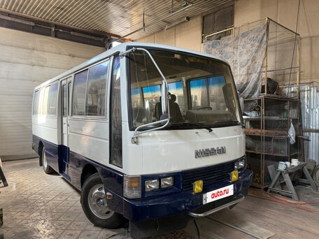 1988 Nissan Civilian, белый, 1150000 рублей, вид 2