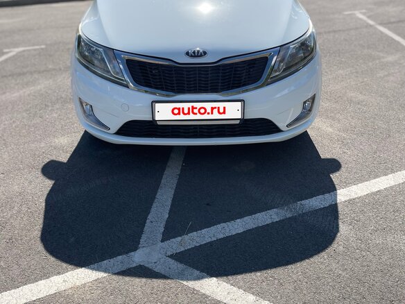 2014 Kia Rio 6-speed III, белый - вид 1
