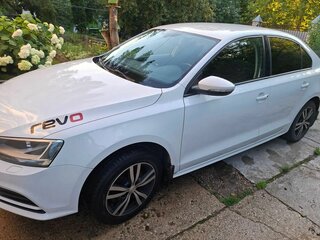 2016 Volkswagen Jetta VI Рестайлинг, белый, 1650000 рублей, вид 2