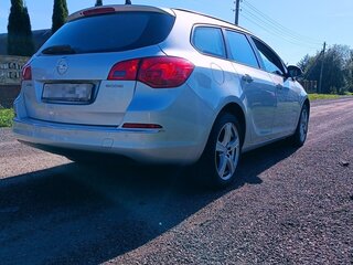2015 Opel Astra J Рестайлинг, серебристый, 1011083 рублей, вид 4