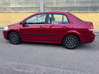 2012 Nissan Tiida I Рестайлинг, красный, 930000 рублей, вид 4
