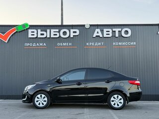 2013 Kia Rio 4-speed III, чёрный, 939000 рублей, вид 4