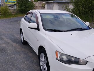 2010 Mitsubishi Lancer X, белый, 650000 рублей, вид 3