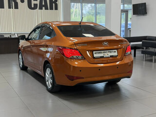 2015 Hyundai Solaris I Рестайлинг, оранжевый, 895000 рублей, вид 3