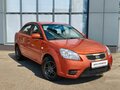 2010 Kia Rio II Рестайлинг, оранжевый - вид 2