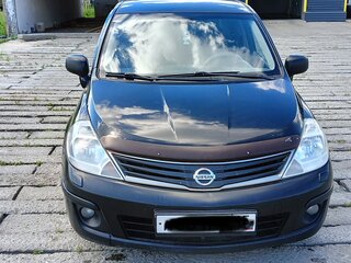2010 Nissan Tiida I Рестайлинг, чёрный, 700000 рублей, вид 1