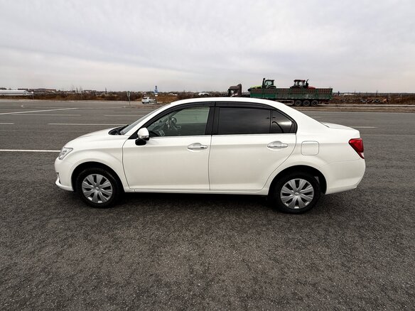 2013 Toyota Corolla Axio XI (E160, E170, E180), белый, 990000 рублей - вид 10