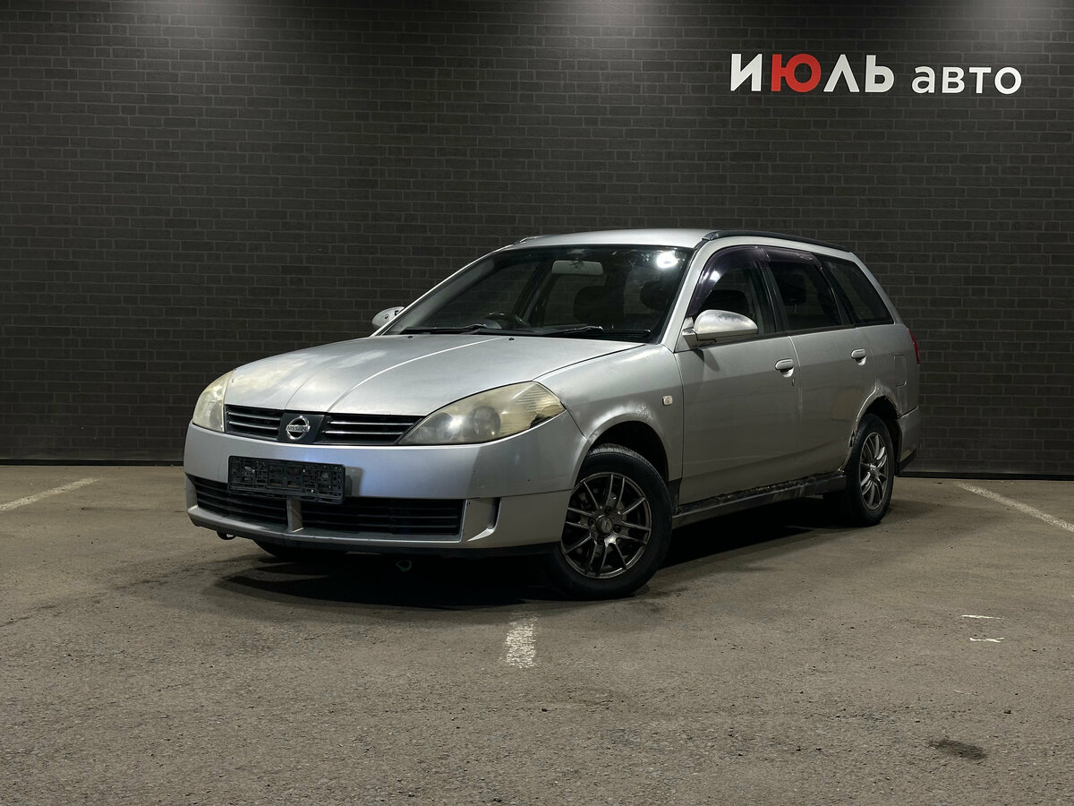Открыть фотографии: Nissan Wingroad II (Y11) Рестайлинг