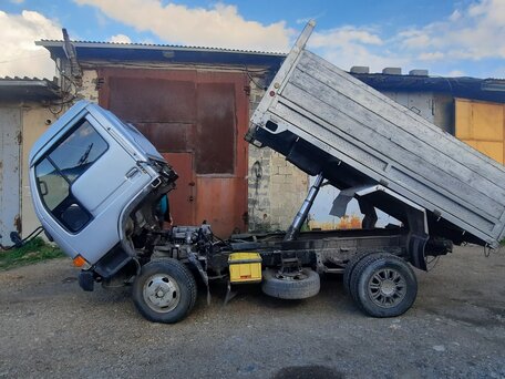 1994 Nissan Atlas, серый, 1665000 рублей, вид 3
