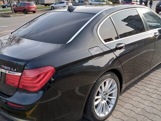 2011 BMW 7 серии Long 750Li xDrive V (F01/F02/F04), чёрный, 1350000 рублей, вид 4