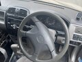 2000 Mazda Demio I (DW), серый - вид 4