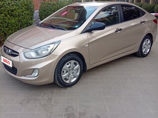 2012 Hyundai Solaris I, бежевый, 720000 рублей, вид 1