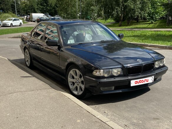 1998 BMW 7 серии 735i III (E38) Рестайлинг, чёрный - вид 1