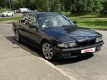 1998 BMW 7 серии 735i III (E38) Рестайлинг, чёрный - вид 1