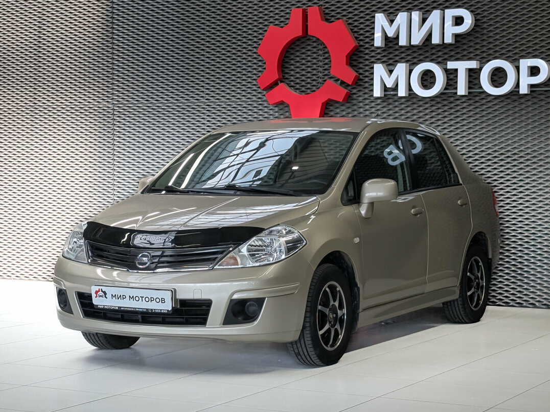 Открыть фотографии: Nissan Tiida I Рестайлинг