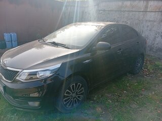 2015 Kia Rio III Рестайлинг, чёрный, 740000 рублей, вид 1