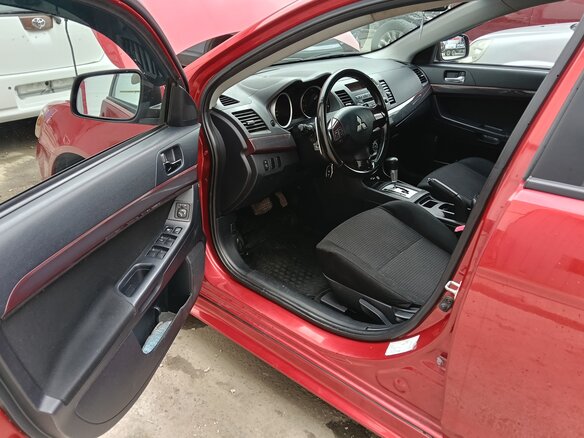 2008 Mitsubishi Lancer X, красный, 649000 рублей - вид 10