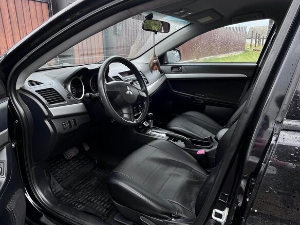2008 Mitsubishi Lancer X, чёрный, 570000 рублей - вид 9