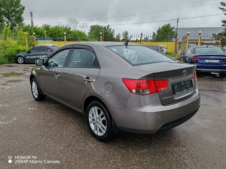 2011 Kia Cerato 6-speed II, серый, 1099000 рублей, вид 4