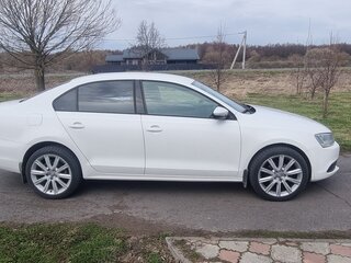 2012 Volkswagen Jetta VI, белый, 900000 рублей, вид 2