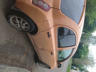 2003 Nissan March III (K12), оранжевый, 320000 рублей, вид 2