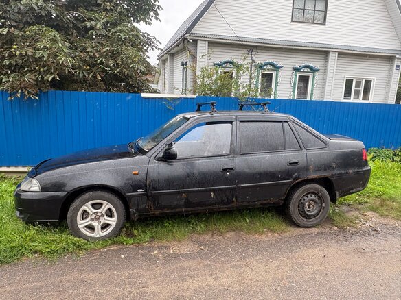 2012 Daewoo Nexia I Рестайлинг, чёрный, 100000 рублей - вид 1