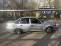 2012 Daewoo Nexia I Рестайлинг, серебристый, 140000 рублей - вид 1