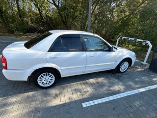 1999 Mazda Familia VIII (BJ), белый, 230000 рублей, вид 3