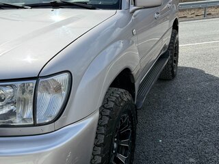 2002 Toyota Land Cruiser 100 Series Рестайлинг 1, серый, 2000000 рублей, вид 2