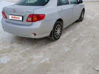 2010 Toyota Corolla X (E140, E150), серебристый, 900000 рублей, вид 2