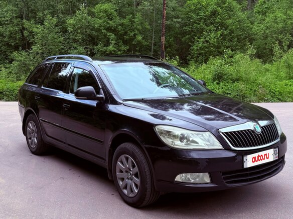 2010 Skoda Octavia II (A5) Рестайлинг, чёрный, 750000 рублей - вид 2