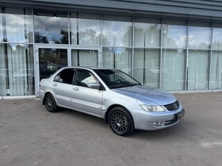 2006 Mitsubishi Lancer IX Рестайлинг, серебристый, 290000 рублей, вид 3