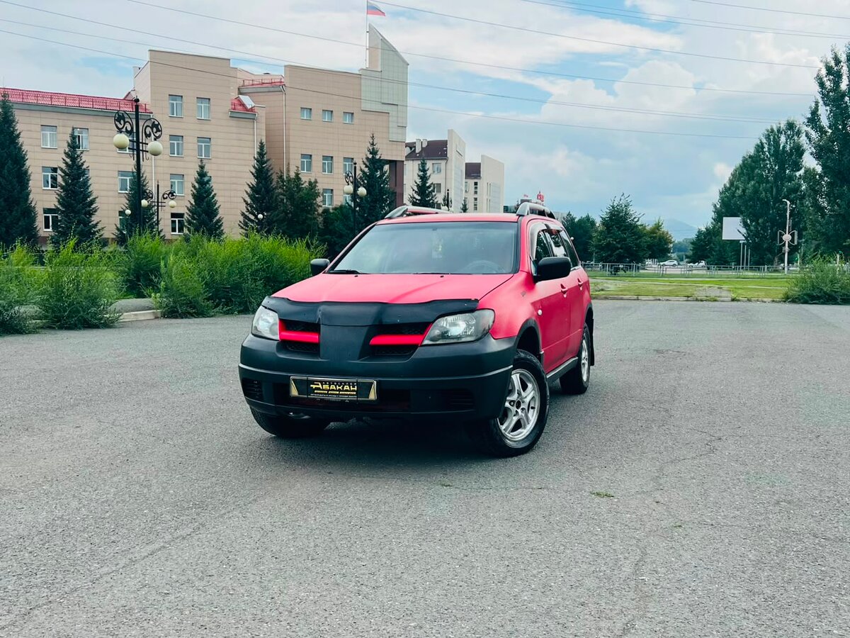 Открыть фотографии: Mitsubishi Outlander I