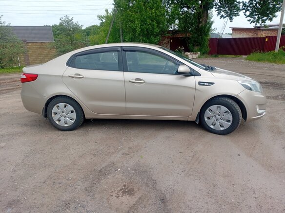 2013 Kia Rio 5-speed III, бежевый, 580000 рублей - вид 7