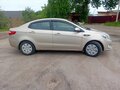 2013 Kia Rio 5-speed III, бежевый, 580000 рублей - вид 7