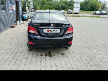 2012 Hyundai Solaris I, чёрный, 810000 рублей, вид 4