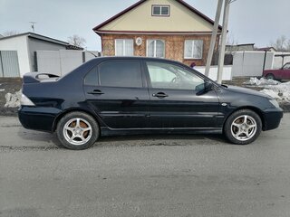 2006 Mitsubishi Lancer IX Рестайлинг, чёрный, 750000 рублей, вид 2