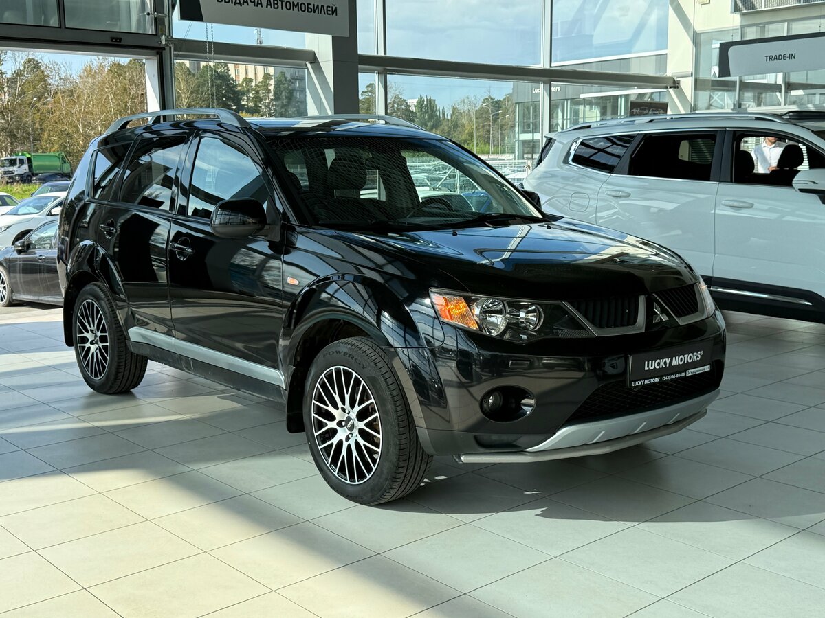 Открыть фотографии: Mitsubishi Outlander II